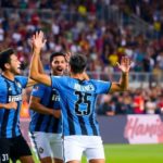 Inter Miami players celebrating on the field during a match.