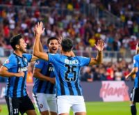 Inter Miami players celebrating on the field during a match.