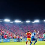 Exciting soccer match at a packed stadium during Leagues Cup.
