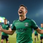 Austin FC player celebrating contract extension on the field.