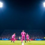 Soccer players from Inter Miami and Charlotte FC clash on field.